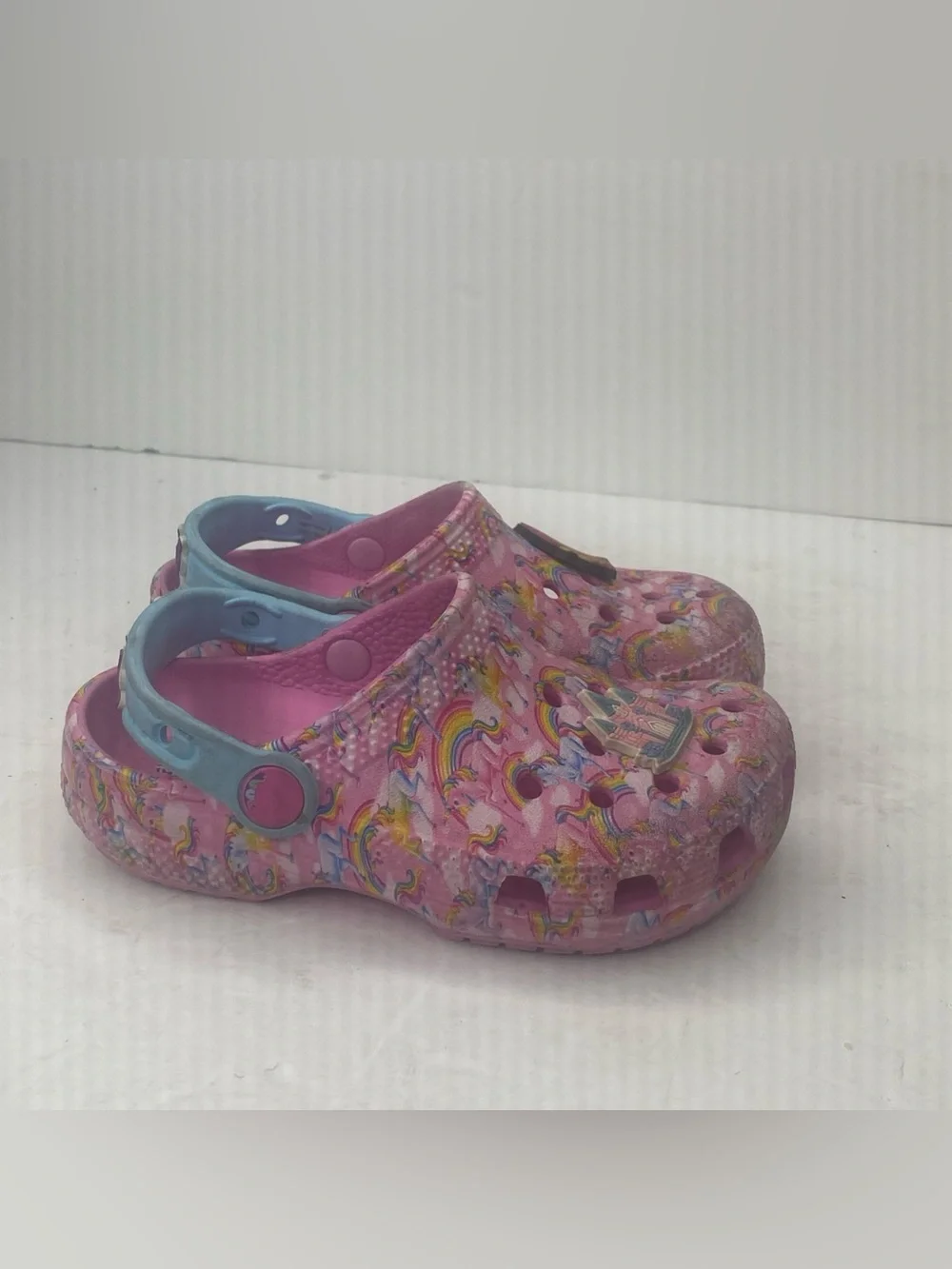 CROCS Pink Rainbow Print Clogs with Blue Heel Strap